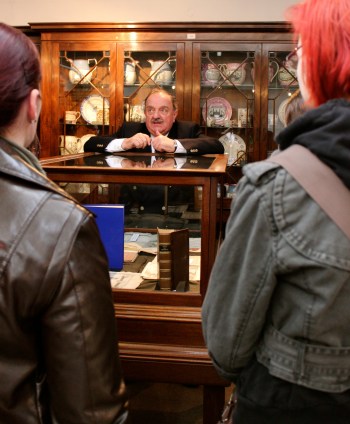 Prof. David Hughes talking to students in the Museum