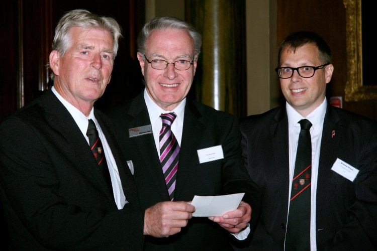 The Master and Charity Steward presenting a cheque to PROSTaid