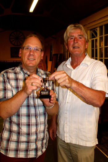 The Master presents winning trophy to the winner