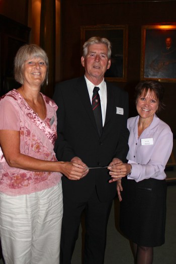 The Master presenting a cheque to the Breast Care Centre, Glenfield Hospital