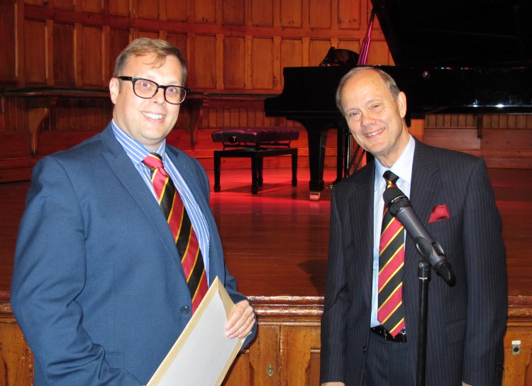 WBro Andy Green receiving the grant award from RWBro David Williamson, AMULL President